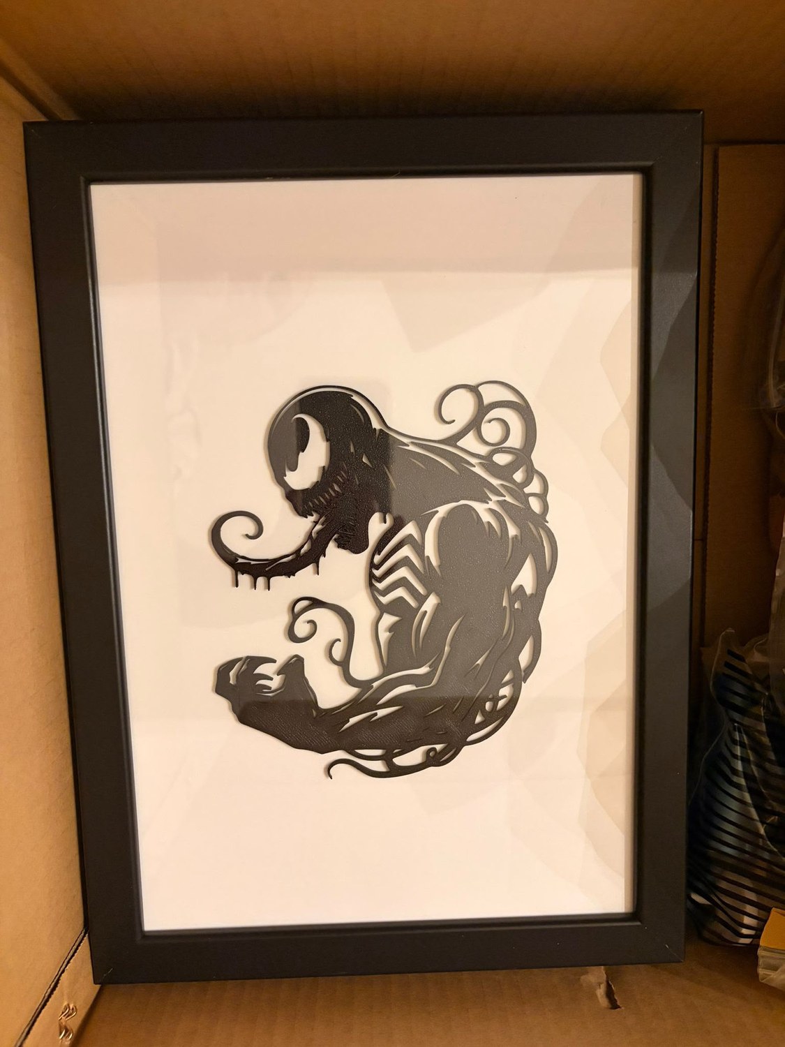 Black character silhouette framed 3D art